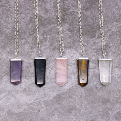Pendant in the shape of a flat gemstone crystal – amethyst